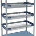 A MetroMax i glassware basket with blue and grey metal shelves.