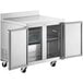 A stainless steel Avantco worktop freezer with two open doors.