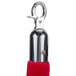 A red metal stanchion rope with chrome ends.