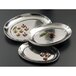 Three American Metalcraft stainless steel trays with food on them.