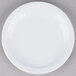 A white Carlisle melamine bread and butter plate.