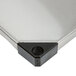 A close-up of a stainless steel Metro shelf.