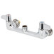 A chrome Equip by T&amp;S wall mounted faucet base with adjustable 8" centers and lever handles.