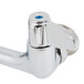 A chrome Equip by T&S wall mounted faucet base with blue lever handles.