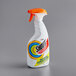 A white SC Johnson Shout triple-acting laundry stain remover spray bottle with an orange and blue label.