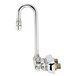 A chrome T&S wall mount workboard faucet with 2 gooseneck spouts and lever handles.