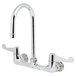 A chrome Equip by T&S wall-mounted faucet with wrist handles and a gooseneck spout.