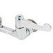 A chrome Equip by T&S wall mounted faucet with blue wrist handles.