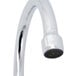 A close-up of a T&S chrome deck-mounted workboard faucet with wrist handles.