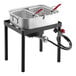 A large stainless steel Backyard Pro dual basket fryer on a black stand.