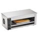 A Vollrath countertop cheese melter with bread inside.