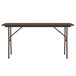 A brown rectangular Correll folding table with legs.