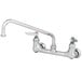 The T&S chrome wall mount pantry faucet with lever handles.