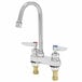 A T&S chrome deck mounted lavatory faucet with two lever handles.