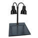 A Hanson Heat Lamps black carving station with two black shades above a black surface.