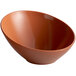 A brown slanted melamine bowl with a pumpkin design.