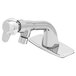 A silver T&S metering faucet with a handle.