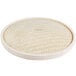 A round bamboo steamer cover with a woven pattern.