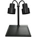 A Hanson Heat Lamps black dual bulb carving station on a black synthetic granite base.