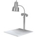 A Hanson Heat Lamps stainless steel carving station with white solid base.