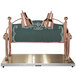 A Hanson Heat Lamps bright copper carving station with two copper lamps on a metal surface.