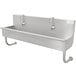 An Advance Tabco stainless steel multi-station hand sink with electronic faucets.