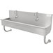 An Advance Tabco stainless steel multi-station hand sink with three electronic faucets.