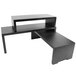 A black rectangular Tablecraft riser set on a table with two shelves.