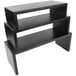 A Tablecraft black painted wood 3-piece riser set with three black shelves stacked on a table.