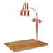 A Hanson bright copper carving station lamp on a maple wood surface.