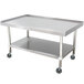 A stainless steel Advance Tabco equipment stand with wheels.