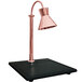 A Hanson Heat Lamps copper carving lamp on a black synthetic granite base.