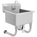 An Advance Tabco stainless steel hand sink with a knee operated faucet.