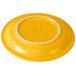 A Fiesta Daffodil china appetizer plate with a yellow center and white rim.