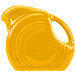 A Fiesta Daffodil yellow pitcher with a handle.