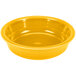 A close up of a yellow Fiesta china bowl.