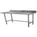 An Advance Tabco stainless steel work table with a metal surface.