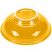 A yellow Fiesta pedestal serving bowl with a white rim.