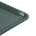 A close-up of a slate blue Cambro dietary tray.