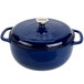 A Lodge indigo blue enameled cast iron Dutch oven with a lid.