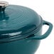 A Lodge lagoon blue enameled cast iron dutch oven with lid.
