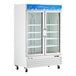 An Avantco white swing glass door merchandiser refrigerator.