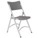 A National Public Seating folding chair with a grey seat and back and metal legs.