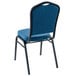 A blue National Public Seating stackable chair with black metal legs.