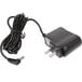 A black power cord with metal plugs for a Tor Rey digital receiving bench scale.
