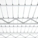 A close-up of a Metro Super Erecta wire rack shelf.