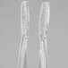 A pair of clear plastic tongs with flat grips.