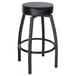 A Lancaster Table & Seating black swivel backless bar stool with a black vinyl seat.