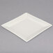A white square Homer Laughlin china plate.