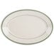 A white oval china platter with a green striped edge.
